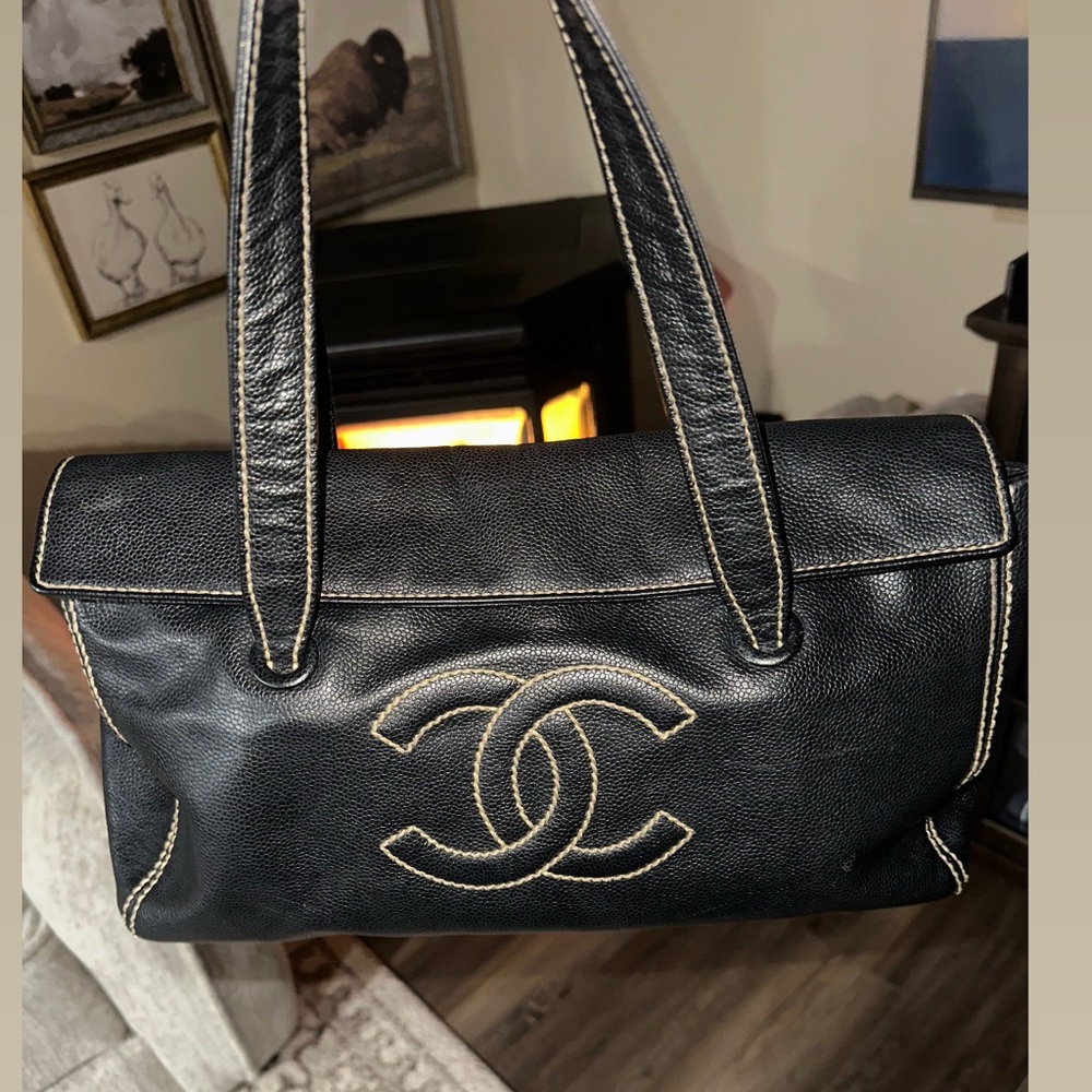 CHANEL Black Leather Shoulder Bag with Gold Stitching